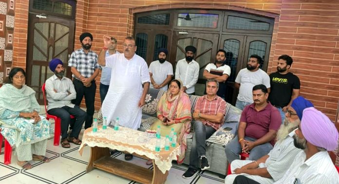 Former Minister, Chander Parkash Ganga addressing an election meeting at Vijaypur on Friday.