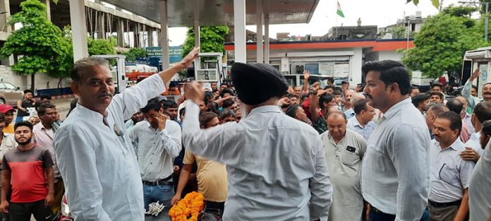 Cong leader Satish Sharma addressing a public meeting in Jammu on Saturday.