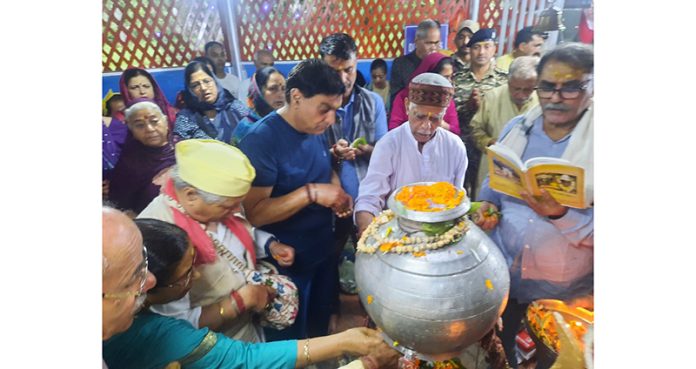 Devotees performing religious rituals at Tirath Raj Kapal Mochan Shopian on Saturday.