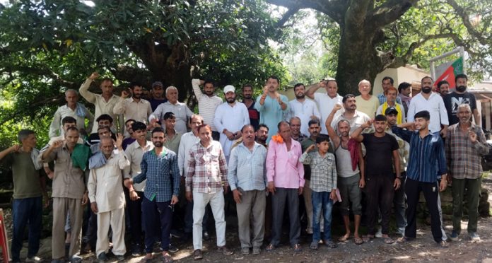 BJP leader, Ranbir Singh Pathania along with locals of a remote village in Udhampur on Thursday.