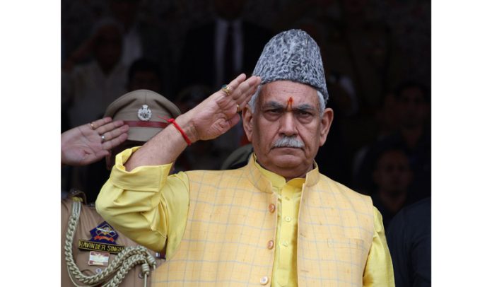 LG Manoj Sinha takes salute during Independence Day parade at Bakshi Stadium in Srinagar.—Excelsior/Shakeel