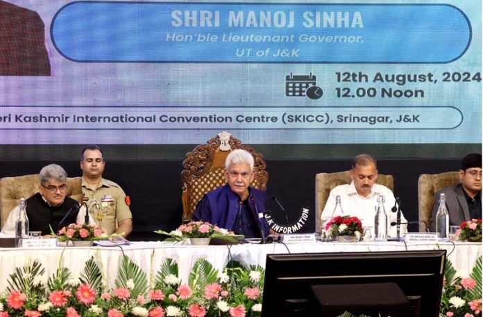 LG Manoj Sinha addressing a press conference on J&K Budget at SKICC Srinagar on Monday. -Excelsior/Shakeel