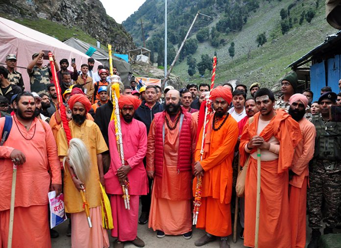 Chhari Mubarak led by Mahant Deependra Giri Ji on way to Sheshnag on Saturday.