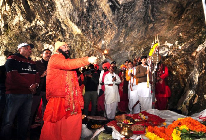 Mahant Deependra Giri Ji and Sadhus performing Puja at Shri Amarnath Ji cave.