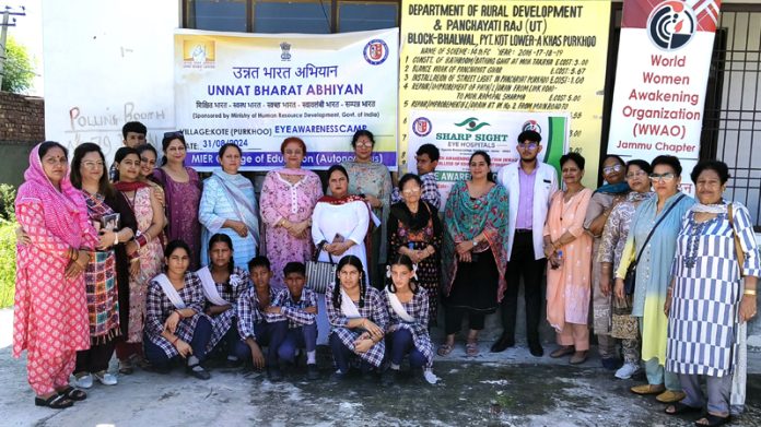 Teams of World Women Awakening Organisation and Sharp Sight Eye Hospital teams posing during eye awareness camp.