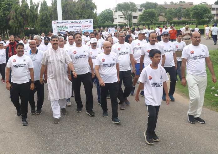 MP Jugal Kishore participating in Walkathon at Jammu organised by Vascular Society of India at Jammu University on Sunday. -Excelsior/Rakesh