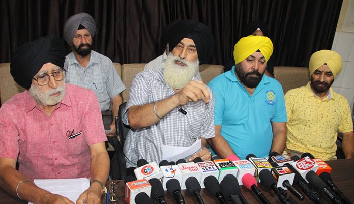 SPF President Balvinder Singh and others addressing a press conference at Jammu. — Excelsior/Rakesh