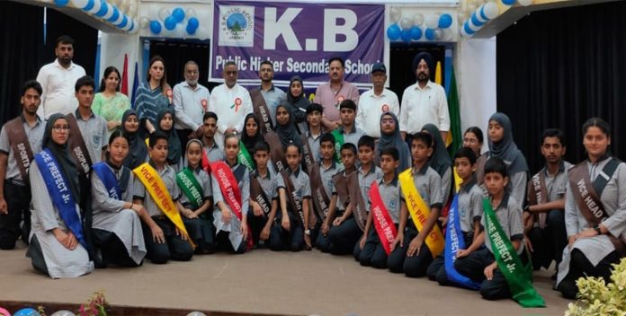 Newly elected student council members posing along with dignitaries.