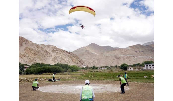 Paraglider landing during Pre-Paragliding Accuracy World Cup event at Leh.