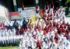 Students in large number posing along with teachers during a Volleyball tournament at Poonch.