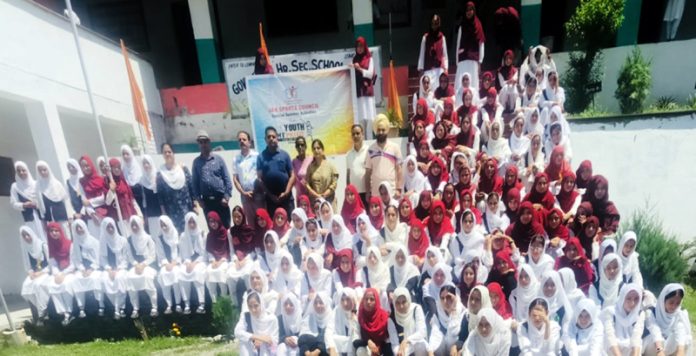 Students in large number posing along with teachers during a Volleyball tournament at Poonch.