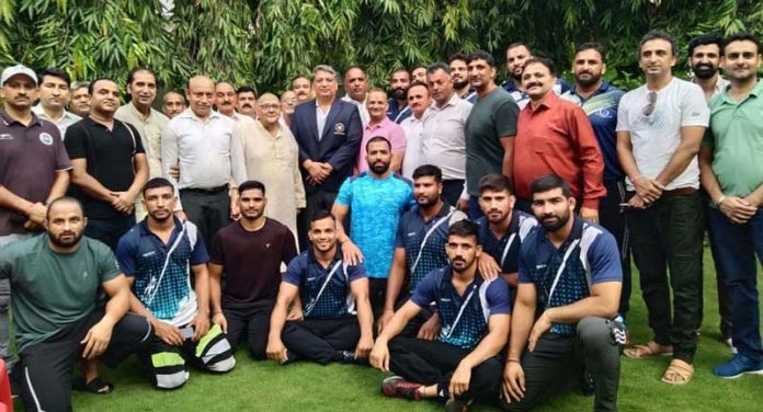 J&K Wrestling Association members posing with Dushyant Sharma at Jammu.