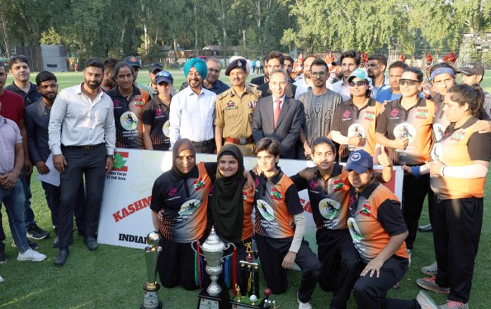 Winning team posing along with dignitaries during prize distribution ceremony at Srinagar. —Excelsior/Shakeel