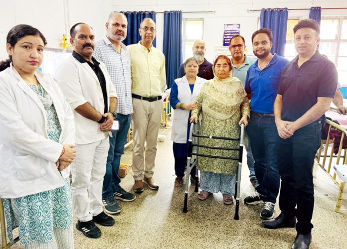 GMC Udhampur Principal Dr Mritunjay Gupta with doctors, staff and patient after successful surgery.