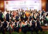 Indian paralympic contingent posing along with Sports Minister Mansukh Mandaviya at New Delhi.