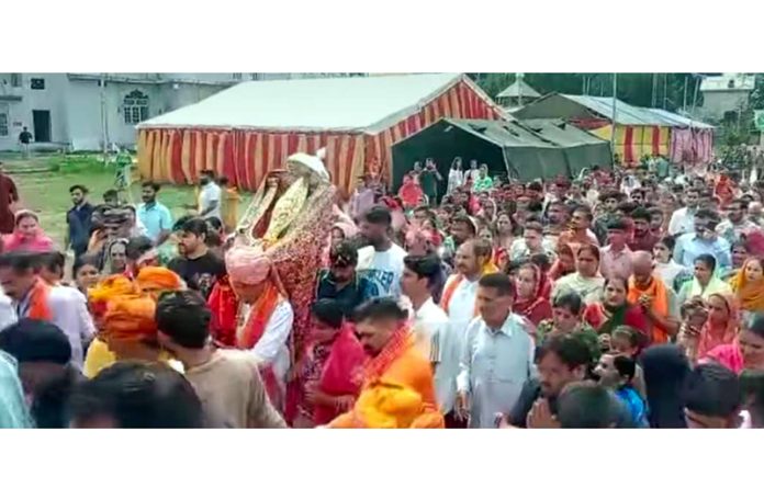 Devotees accompanying the Chhari of Machail Mata in Kishtwar on Monday. — Excelsior/Tilak Raj