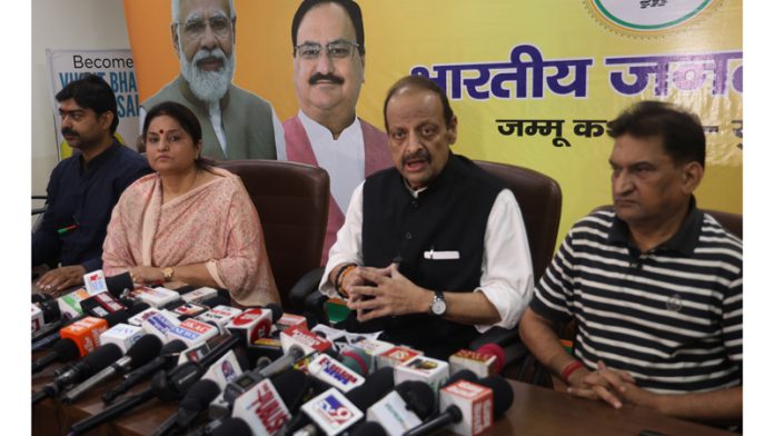 Senior BJP leader Devender Singh Rana flanked by his party colleagues, Priya Sethi and Balbir Ram Rattan addressing a press conference at Jammu on Saturday. -Excelsior/ Rakesh