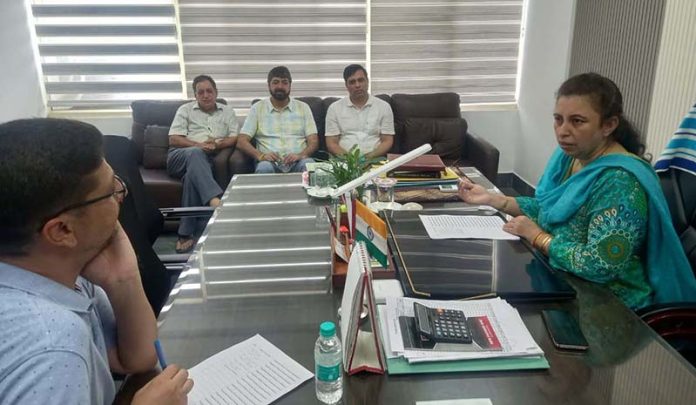 Additional Commissioner STD Jammu Namrita Dogra chairing a meeting on Friday.