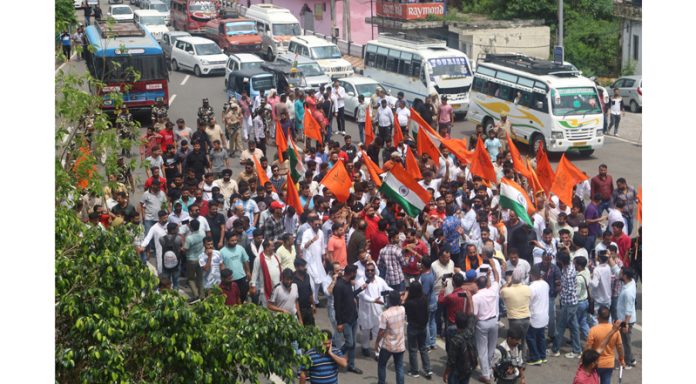 Yuva Rajput Sabha members taking out protest rally for restoration of Statehood to J&K. — Excelsior/Rakesh