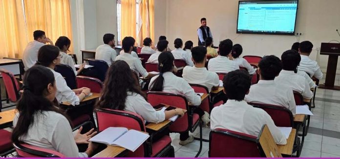 Advocate Akshay Gupta sharing valuable insights with JU Law School students during interactive session on Friday.