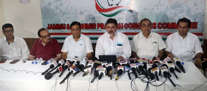 AICC Secy Pranav Jha, flanked by others addressing press conference in Jammu. -Excelsior/Rakesh