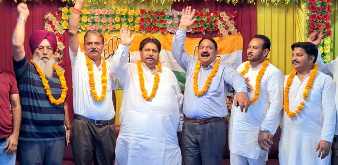 JKPCC Working President, Raman Bhalla posing along with others during a meeting in Jammu on Tuesday.