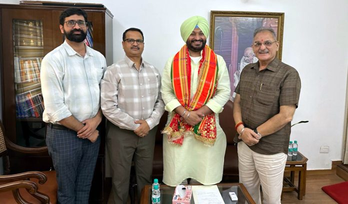 Senior BJP leader and former Dy CM J&K, Kavinder Gupta during a meeting with MoS Railways, Ravneet Singh Bittu on Wednesday.