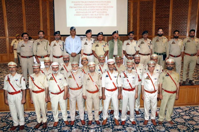 IGP Bhim Sen Tuti with the newly promoted officers in Srinagar on Thursday.