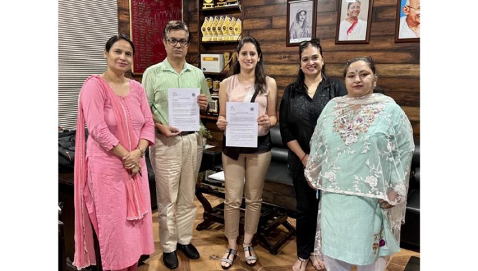 Members of FICCI FLO (JKL) and GCW Parade after signing an MoU.