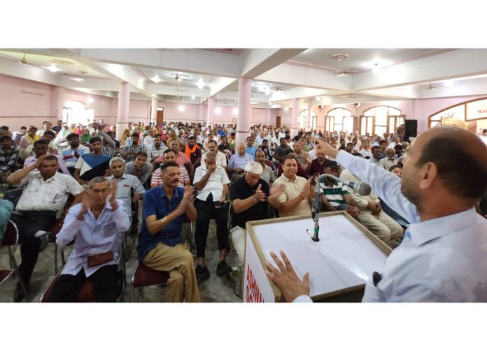 Congress leader Mohinder Bhardwaj addressing a rally at Vijaypur on Sunday.