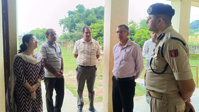 DEO and SSP Samba inspecting polling station.