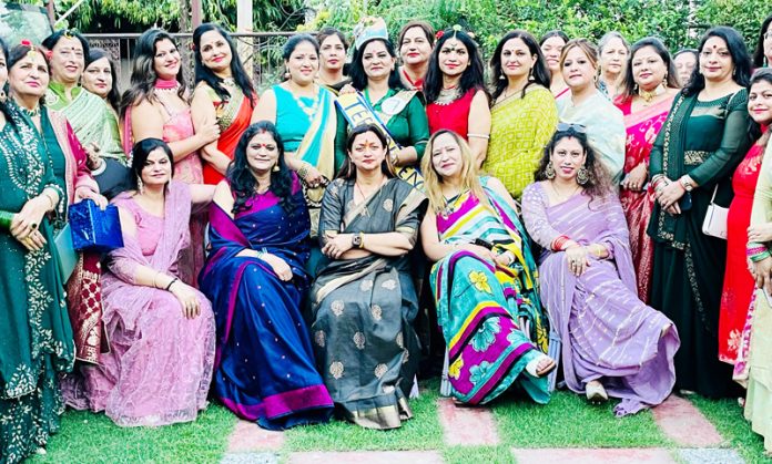 Women during celebration of Teej festival at Jammu on Friday.