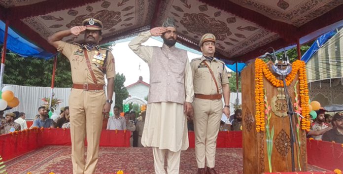 DDC Anantnag Chairman saluting Tricolour during Independence Day celebrations. — Excelsior/Sajad Dar