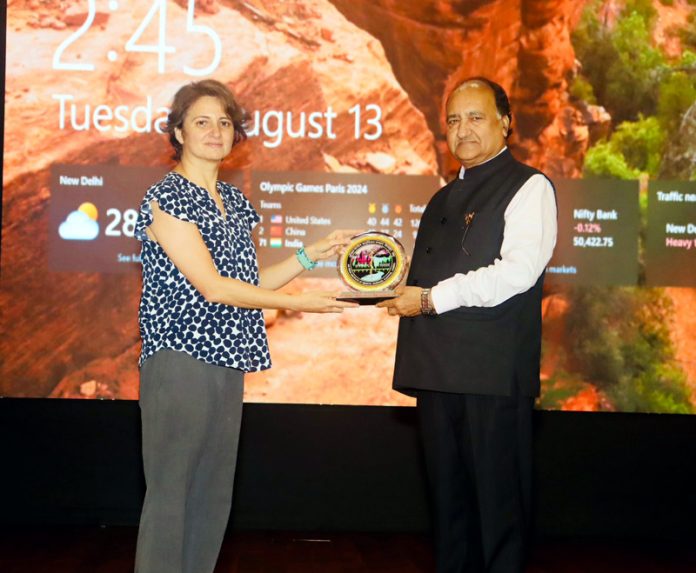 Dr Shakti Gupta, Director AIIMS, Jammu felicitating Dr Neha Nanda on Tuesday.