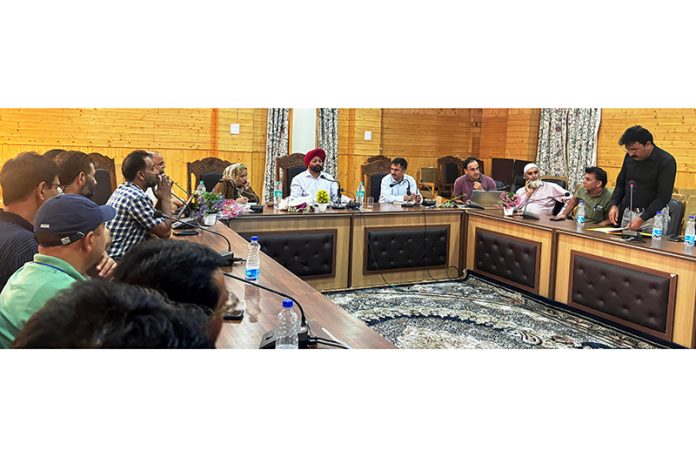 Director Ayush J&K, Dr Mohan Singh chairing a meeting on Friday.