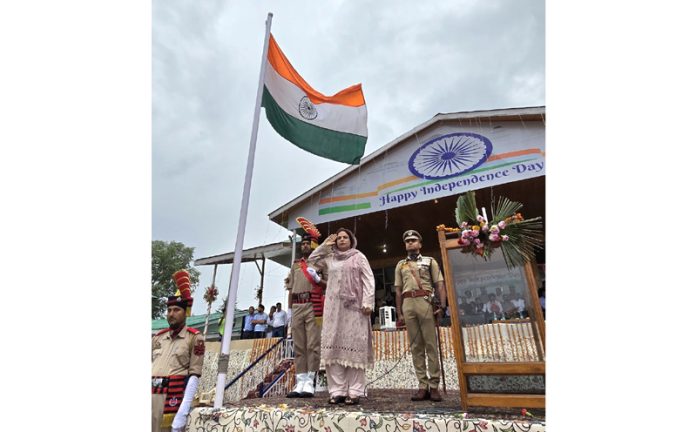 Chairperson DDC Baramulla saluting Tricolour at Sports Stadium.