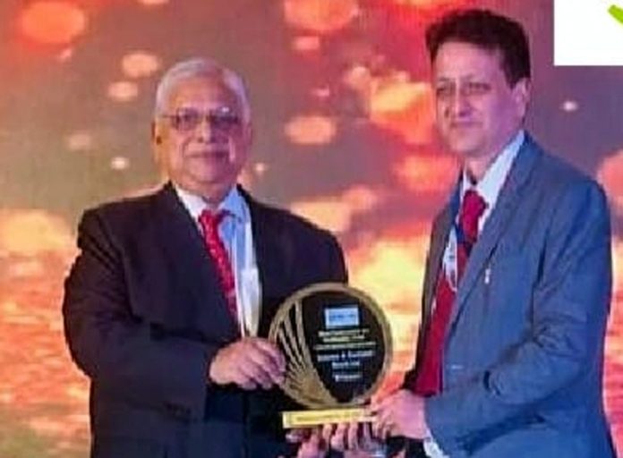 General Manager Rajesh Gupta receiving an award during a function held on Monday.