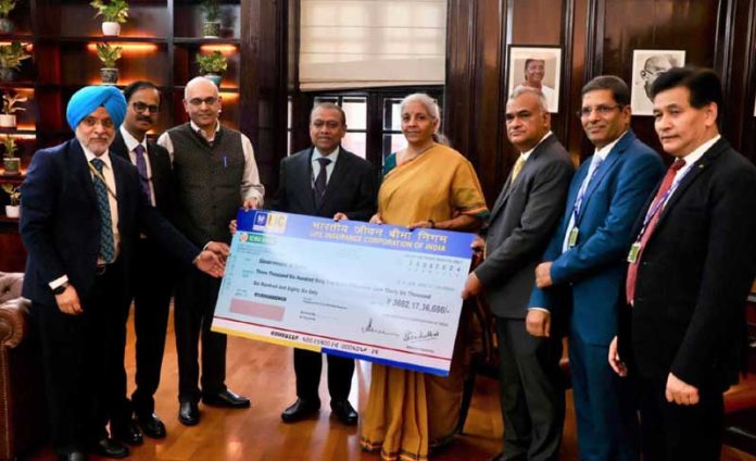 LIC officials handing over dividend cheque to Finance Minister Nirmala Sitharaman on Thursday.