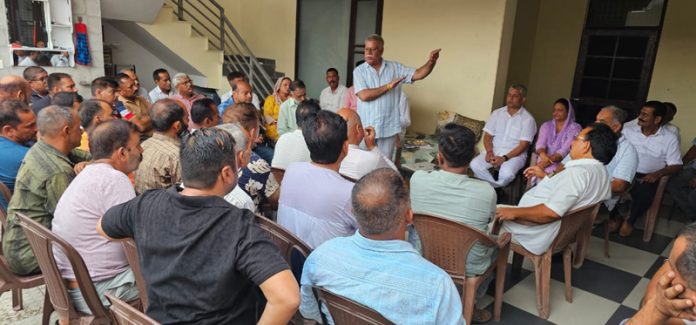 Senior BJP leader Choudhary Sukhnandan addressing a public meeting in Jammu on Tuesday.