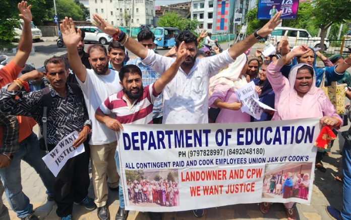 Cooks and CPWs of Education Department during a protest near Hari Singh Park in Jammu. -Excelsior/Rakesh