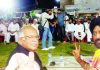 JKPCC chief T H Karra, flanked by Cong candidate T S Tony during public meeting in Bahu constituency.