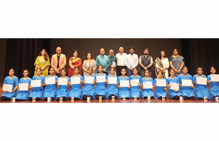 Natrang artists posing for a photograph with Director AIIMS Jammu and other.