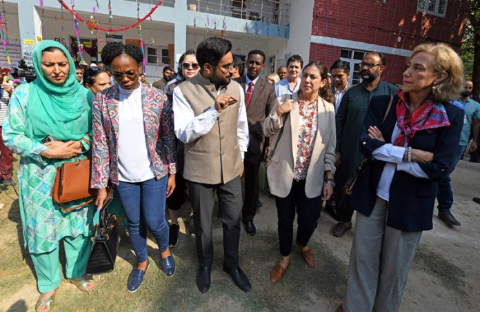 A delegation of diplomats from various countries arrives at a polling booth in Budgam to witness the voting process. -Excelsior/Shakeel