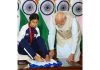 Paris Paralympics medallist from Jammu and Kashmir Sheetal Devi presenting a special autographed jersey to Prime Minister Narendra Modi.