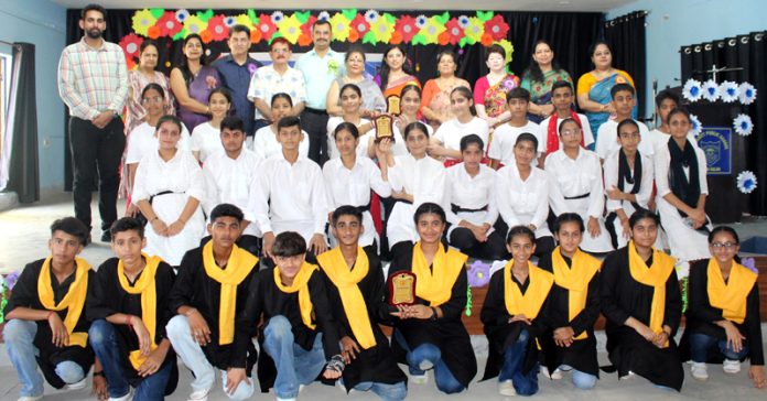 Winner students of Youth Talent Search Competition 'Nukkad Natak' pose for a group photograph along with others at Humanity Public School, Bassi Kalan.