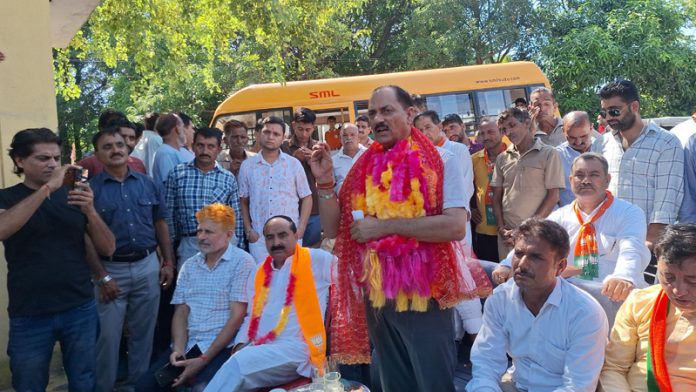 BJP candidate from Hiranagar addressing a rally at Kore Punny on Sunday. -Excelsior/Pardeep