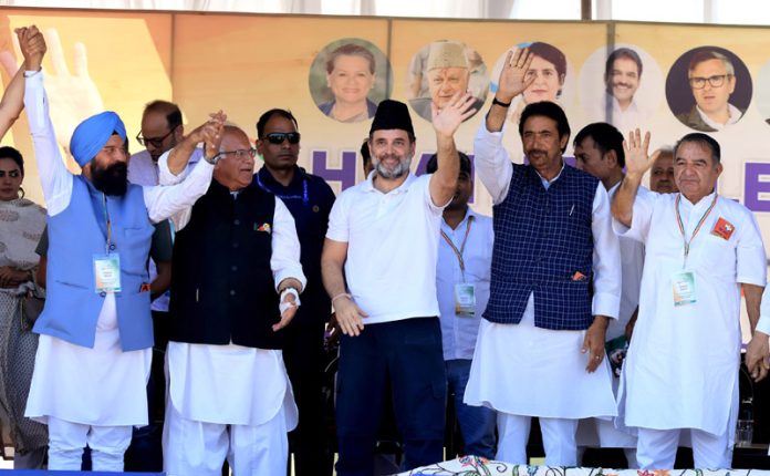 Leader of Opposition in Lok Sabha Rahul Gandhi with Congress candidates T.H. Karra & GA Mir during an election rally in Srinagar. -Excelsior/Shakeel