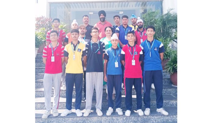 Students of Jammu Sanskriti School posing with medals.