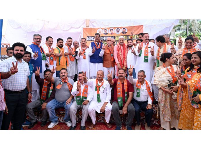 BJP vice president and party candidate, Sham Lal Sharma at an election meeting with other senior leaders in Purkhoo on Wednesday.