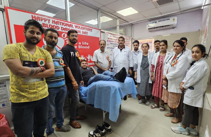 Volunteers and staff of Government Hospital, Gandhi Nagar (Jammu) during a blood donation camp.